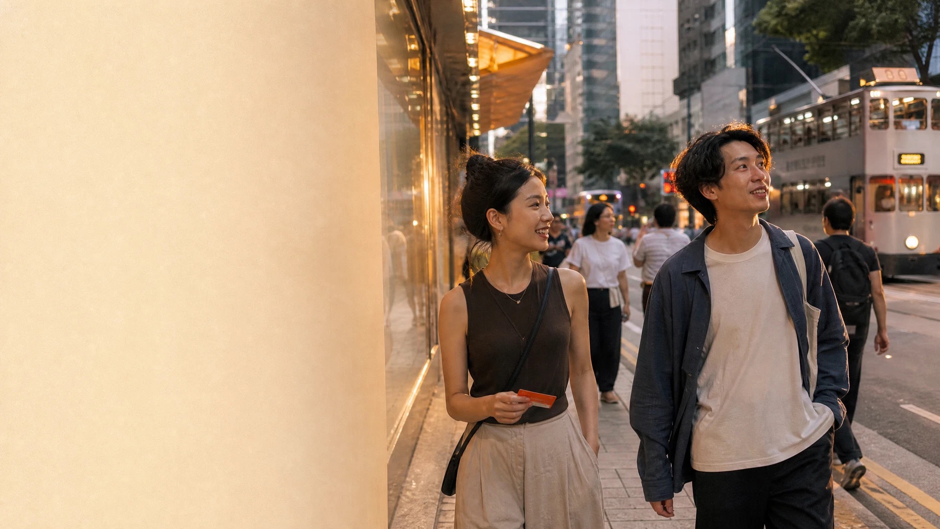 Friends walking through Central, Hong Kong in early evening